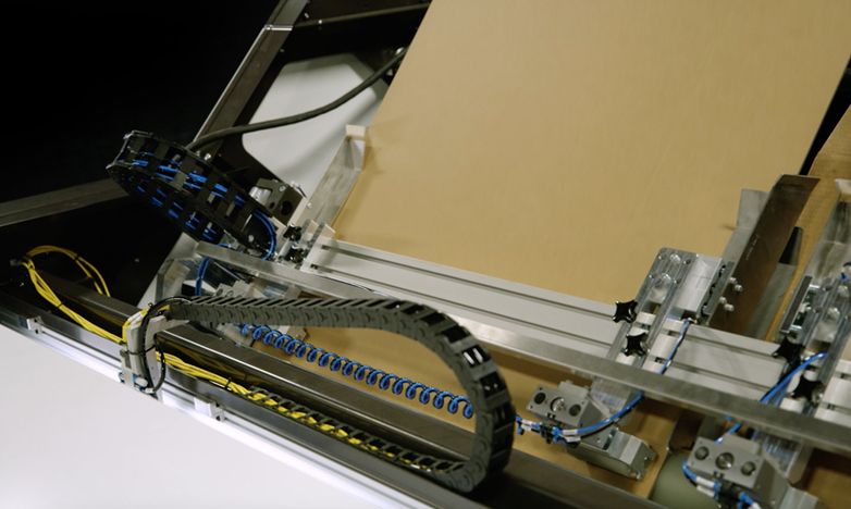 A machine from Packsize Technologies AB in operation